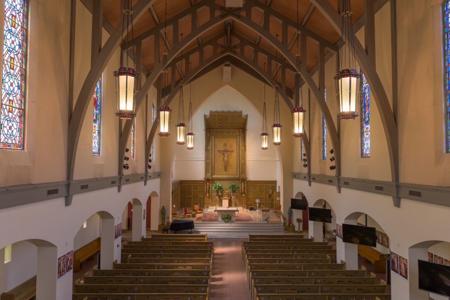 Large interior space with painted walls, beams and ceiling